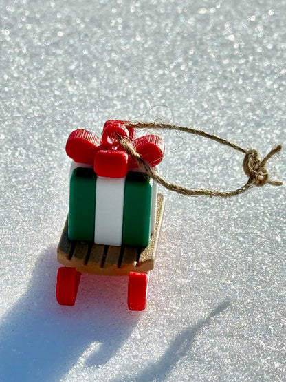 Gift Sled Christmas Ornament – A Festive Ride Full of Cheer