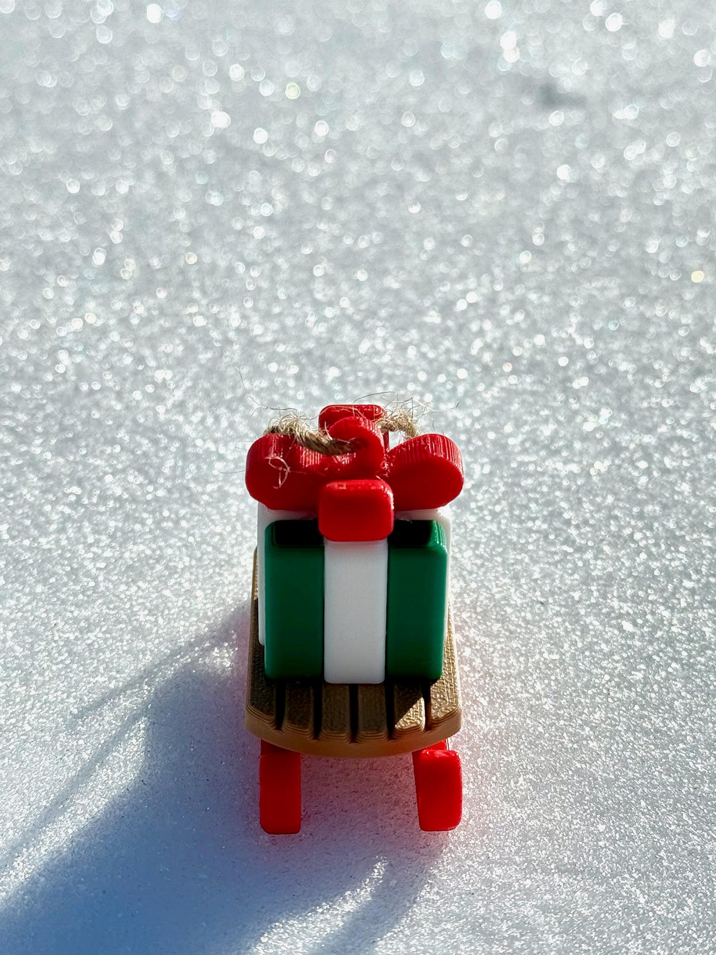 Gift Sled Christmas Ornament – A Festive Ride Full of Cheer